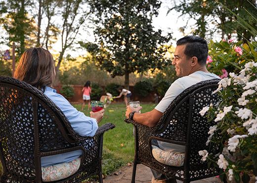 Couple sitting in the backyard