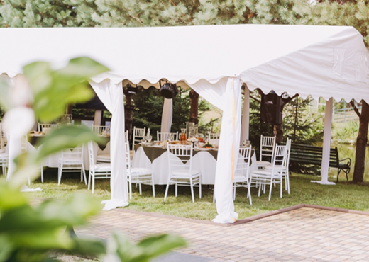 Event seating under a tent.