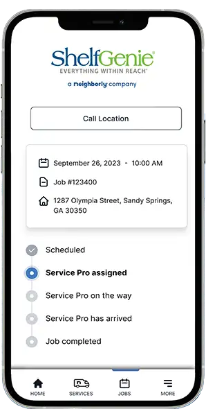 Neighborly App job progress marked 'Service Pro assigned' displayed on smartphone screen.