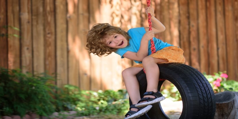 boy-on-tire-swing